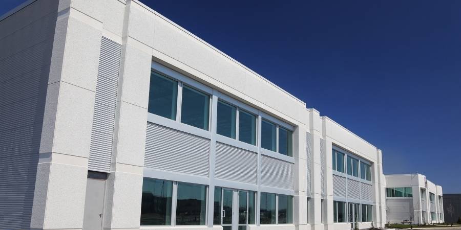 Professional painters completing a commercial building project in Wilmington, Delaware with clean, modern results.